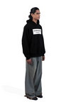 Oversized unisex 'Advertise here' hoodie (Black)