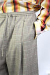Pleated cullotes in checkered pattern (Beige)