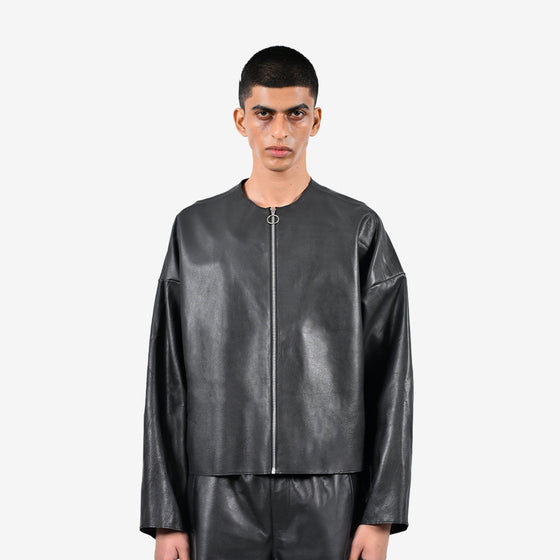Oversized raw-edge leather bomber jacket