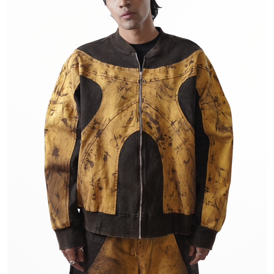 Oversized unisex panelled denim jacket with hand-painted mud washed surface (Copper)